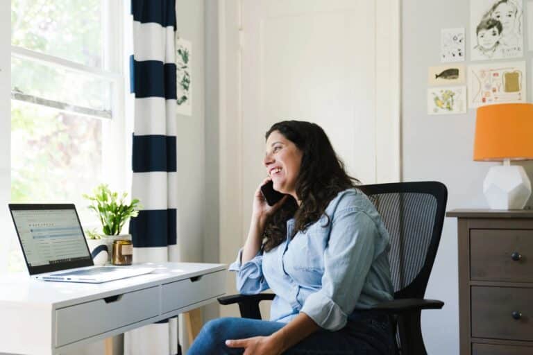 Woman on the phone in her home office