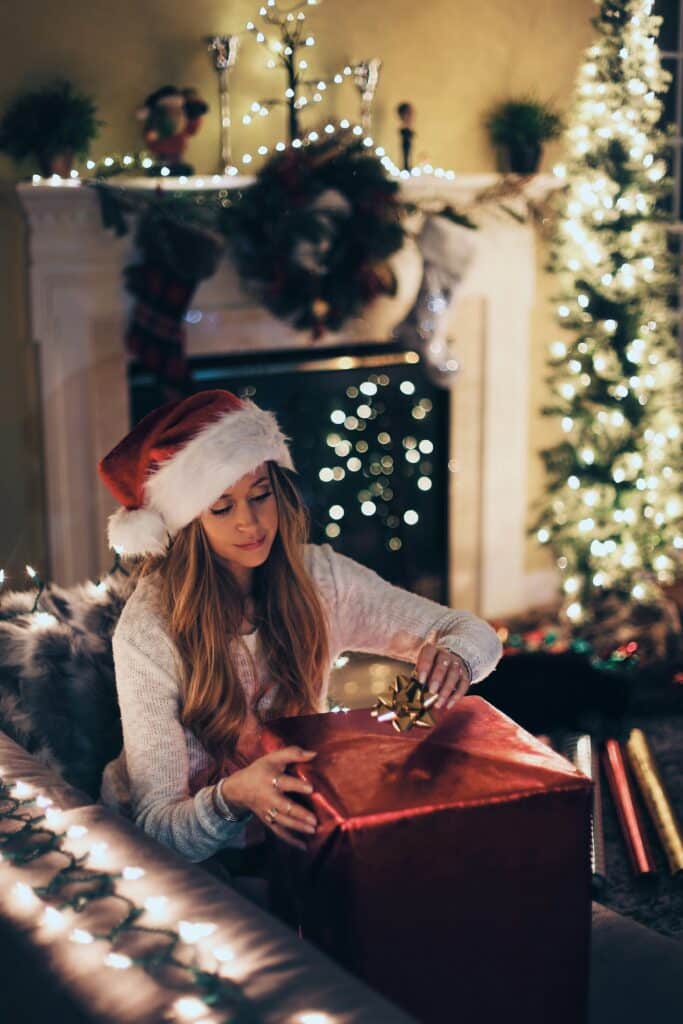 Woman wrapping a Christmas present