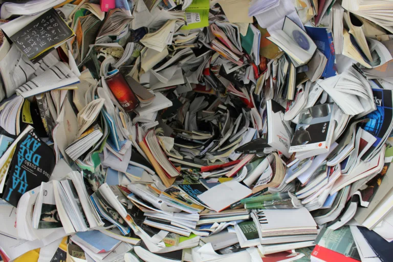 Vortex of papers as illustration to the post "when to hire a professional home organizer"