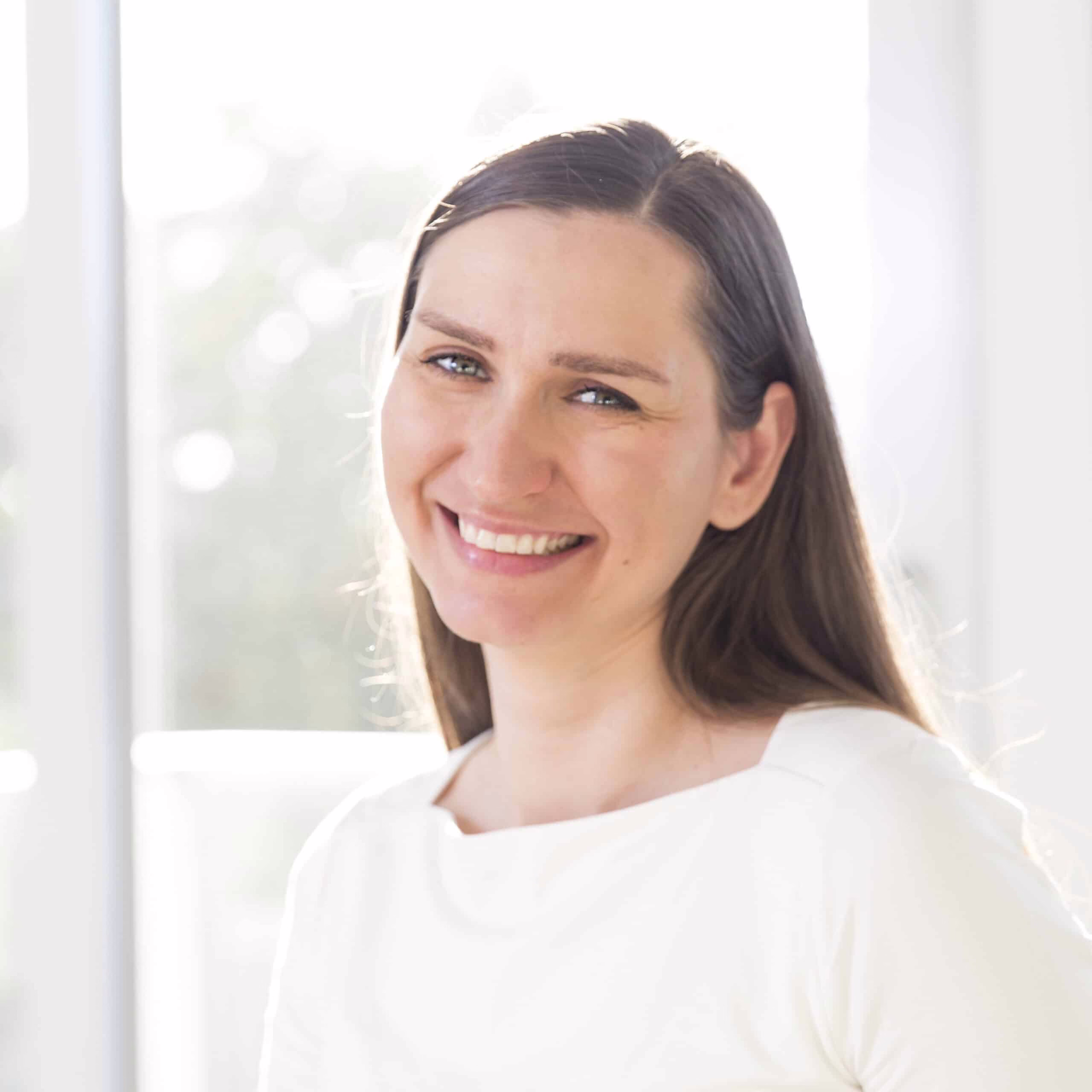 Portrait of Olena, owner of professional organizers company Harmony Home Organizing